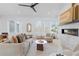 Bright living room featuring a fireplace, neutral tones, and natural light at 160 Cedarwood Ln, Roswell, GA 30075