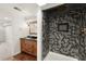 Basement bathroom featuring a modern walk-in shower with hexagon tile at 2148 Allgood Rd, Marietta, GA 30062