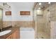 Bathroom with granite vanity, soaking tub, and shower at 272 14Th St # 23, Atlanta, GA 30309