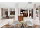 Open concept dining area with a wooden table and modern chairs at 272 14Th St # 23, Atlanta, GA 30309