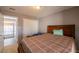 Well-lit bedroom with a queen bed and closet at 3301 Henderson Mill Rd # X4, Atlanta, GA 30341