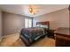 Cozy bedroom with ceiling fan and window at 3301 Henderson Mill Rd # X4, Atlanta, GA 30341