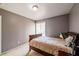 Bright bedroom with a double bed and window at 3301 Henderson Mill Rd, Atlanta, GA 30341