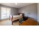 Cozy bedroom with a double bed, desk, and window at 3301 Henderson Mill Rd # X4, Atlanta, GA 30341