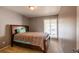 Simple bedroom with a double bed and large window at 3301 Henderson Mill Rd, Atlanta, GA 30341