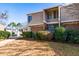 Townhouse exterior with landscaping and walkway at 3301 Henderson Mill Rd, Atlanta, GA 30341