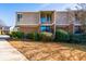 Brick townhouse exterior with landscaping and walkway at 3301 Henderson Mill Rd # X4, Atlanta, GA 30341