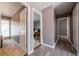 Clean hallway with light walls and wood-look flooring at 3301 Henderson Mill Rd # X4, Atlanta, GA 30341