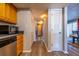 Bright hallway with light gray walls and wood-look flooring at 3301 Henderson Mill Rd # X4, Atlanta, GA 30341