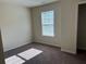 Bright bedroom with a window and closet at 606 Grenier Ter, Lawrenceville, GA 30045