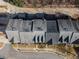 Aerial perspective of townhouses and surrounding neighborhood at 705 Pecan Knoll Dr, Marietta, GA 30008