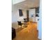 Modern kitchen with white cabinetry and breakfast nook at 199 14Th Ne St # 1512, Atlanta, GA 30309