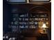Dark wood library with bookshelves and seating at 199 14Th Ne St # 1512, Atlanta, GA 30309