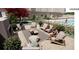 Cozy outdoor lounge with fireplace and seating at 199 14Th Ne St # 1512, Atlanta, GA 30309