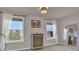 Bedroom with dresser and large windows at 6825 Ashford Manor Way, Cumming, GA 30040