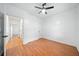 Spacious bedroom with hardwood floors and ceiling fan at 520 Mary Sw St, Atlanta, GA 30310