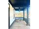 Covered porch with a ceiling fan and comfortable seating area at 520 Mary Sw St, Atlanta, GA 30310
