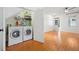 Convenient laundry room with washer, dryer, and ample storage shelves at 520 Mary Sw St, Atlanta, GA 30310