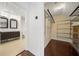 Large walk-in closet with shelving and hanging rods for storage at 520 Mary Sw St, Atlanta, GA 30310