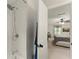 Modern shower with white subway tiles and a view to the bedroom at 3616 Longfellow Trl, Marietta, GA 30062