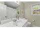 Bright bathroom with a white marble countertop and modern finishes at 3616 Longfellow Trl, Marietta, GA 30062