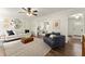 Cozy living room with neutral tones, a plush rug, and ample seating at 3616 Longfellow Trl, Marietta, GA 30062