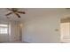 Bedroom showcasing ample wall space, a ceiling fan, and a window for natural light at 3640 Longfellow Trl, Marietta, GA 30062