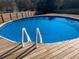 Relaxing above ground pool with wooden deck at 74 Cole Creek Rd, Dallas, GA 30157