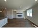 Bright living room featuring hardwood floors, fireplace, and modern white trim at 226 Depot Landing Rd # 56, Auburn, GA 30011