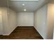 Empty room with wood floors at 226 Depot Landing Rd # 56, Auburn, GA 30011