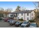 Two-story building with ample parking and mature trees at 3599 Woodbriar Cir # G, Tucker, GA 30084