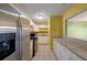 Kitchen with stainless steel appliances and granite countertops at 3599 Woodbriar Cir # G, Tucker, GA 30084