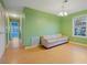 Living room with hardwood floors and large window at 3599 Woodbriar Cir # G, Tucker, GA 30084