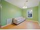 Living room with hardwood floors and large window at 3599 Woodbriar Cir # G, Tucker, GA 30084