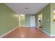 Living room with hardwood floors and access to balcony at 3599 Woodbriar Cir # G, Tucker, GA 30084