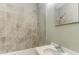 Bathroom featuring tile surround bathtub, single sink, and chrome fixtures at 1116 Northwest Nw Dr, Atlanta, GA 30318