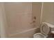 Small bathroom with tub and toilet at 2962 Vining Ridge Ln, Decatur, GA 30034