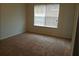 Bright bedroom with neutral carpeting and window at 2962 Vining Ridge Ln, Decatur, GA 30034
