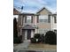 Two-story townhome with neutral siding and landscaping at 2962 Vining Ridge Ln, Decatur, GA 30034