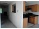 Kitchen with light wood cabinets and black countertops at 2962 Vining Ridge Ln, Decatur, GA 30034