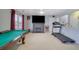 Basement recreation area with fireplace and treadmill at 3643 Southland Ne Dr, Buford, GA 30519