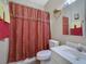 Clean bathroom with a shower/tub combo and updated vanity at 3643 Southland Ne Dr, Buford, GA 30519