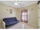 Bedroom with a futon and plenty of natural light at 3643 Southland Ne Dr, Buford, GA 30519