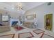 Open concept living room with fireplace, high ceilings and access to dining area at 3643 Southland Ne Dr, Buford, GA 30519
