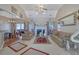 Spacious living room with fireplace, vaulted ceiling, and ample natural light at 3643 Southland Ne Dr, Buford, GA 30519