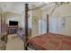 Main bedroom with a cozy sitting area and fireplace at 3643 Southland Ne Dr, Buford, GA 30519