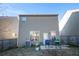 Backyard with a patio area, grill, and full fencing for added privacy and security at 529 Dasheill Ln, Atlanta, GA 30349