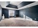 Spacious bedroom with tray ceilings, large window, and natural light at 529 Dasheill Ln, Atlanta, GA 30349