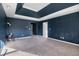 Spacious Primary bedroom with dark blue walls and carpet at 529 Dasheill Ln, Atlanta, GA 30349