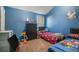 bedroom with two twin beds and ample closet space at 529 Dasheill Ln, Atlanta, GA 30349